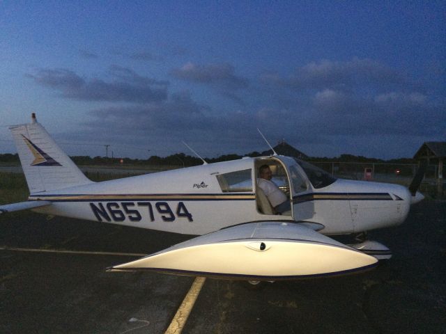 — — - On the ramp at Ocracoke Island. Got off the ground just before twilight ended.