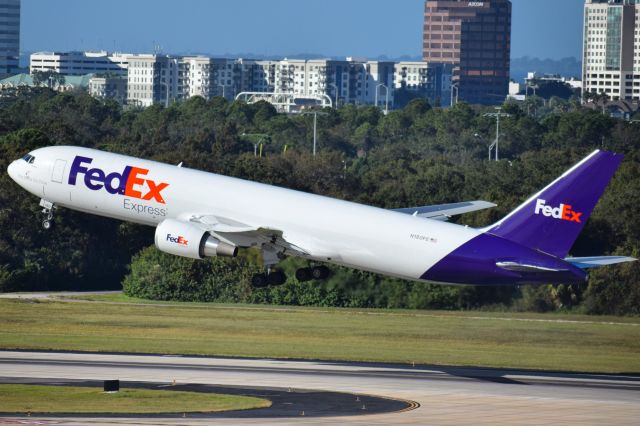 BOEING 767-300 (N180FE) - N180FE departing Runway 19R at Tampa International (TPA) for Memphis International (MEM) as FX692 Heavy