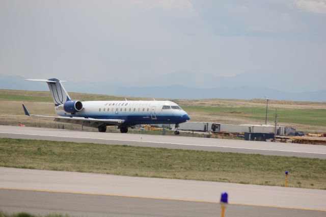 Canadair Regional Jet CRJ-200 (N983SW) - Landing on 34L at DIA with a blown out tire on the nose wheel.