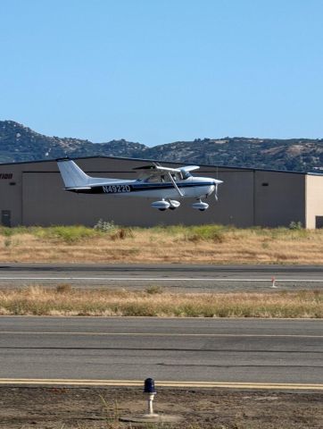 Cessna Skyhawk (N4922D) - N4922D with a fresh paint job on short final for runway 27. I’m soloing the plane in this picture. Photo taken by my CFI.