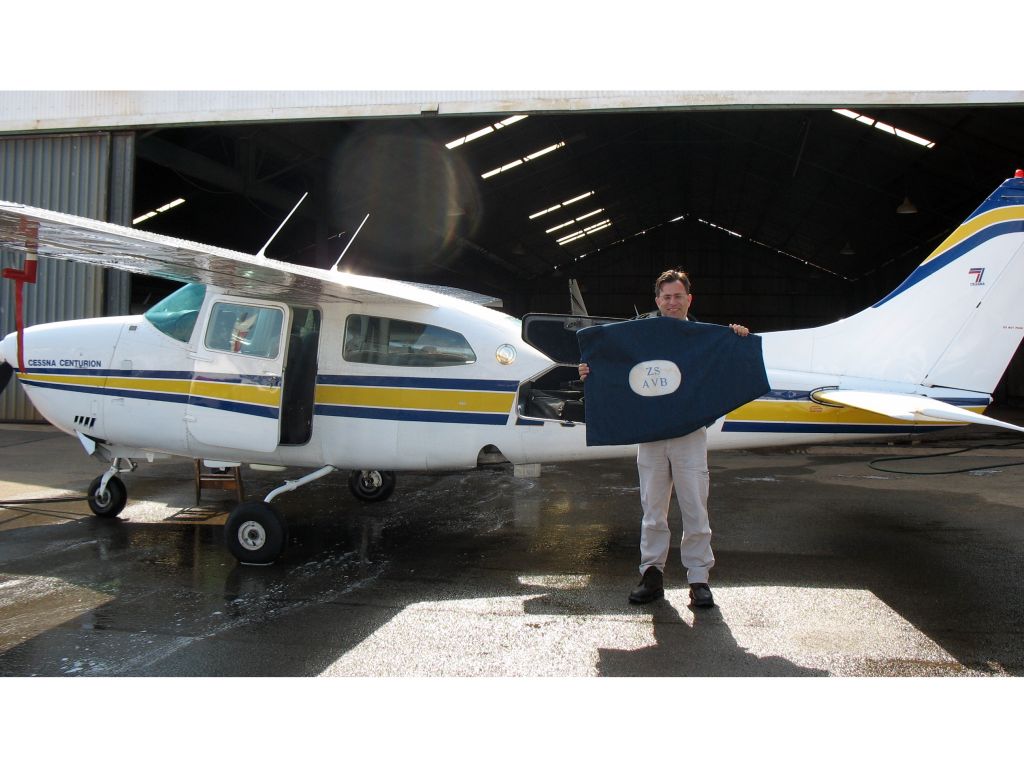 Cessna Centurion (ZS-AVB) - Cessna 210 turbo at Grand Central airport, South Africa.