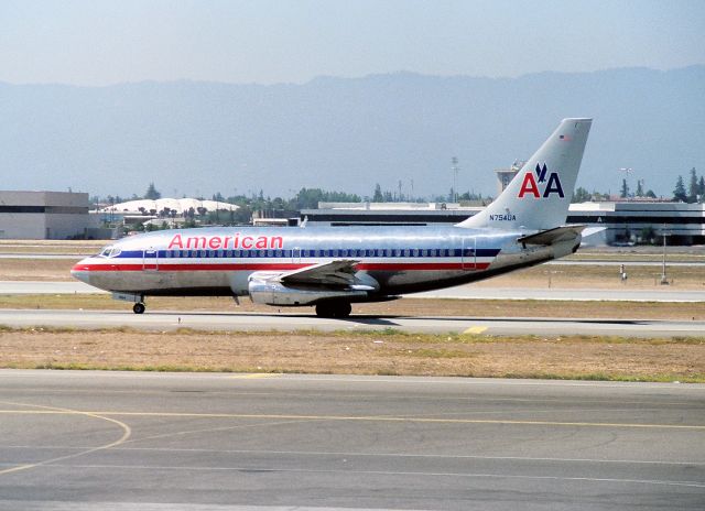 Boeing 737-200 (N754UA) - KSJC - late 1980s view at San Jose - ex AirCal 737 now taken by American on taxi to the terminal C.