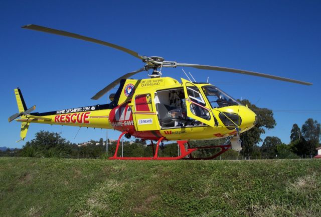 Eurocopter AS-350 AStar (VH-ELR) - The Surf Lifesaving Queensland rescue helicopter (VH-ELR) awaits a mission at its base near the Gold Coast region, Brisbane Australia.   Surf Lifesaving uses the chopper to pull surfers and swimmers to shore.  Thanks to the (all volunteer) Saturday-morning crew for the great tour!