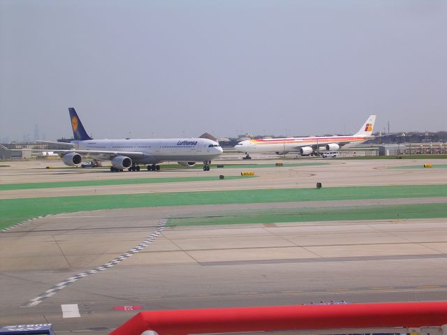 A340 — - Lufthansa and Iberia A340s at KORD 04102010