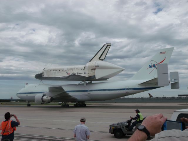 Boeing 747-200 (N911NA) - The Shuttle Carrier Aircraft (SCA) at IAD passing by.