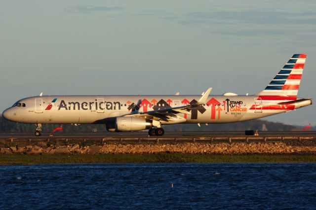 Airbus A321 (N162AA) - American A321 in special 'Stand up to Cancer' livery departing BOS on 5/13/22. 