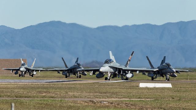 McDonnell Douglas FA-18 Hornet (A21113) - RAAF, 2OCU Squadron, line up their F-18 Classic Hornets on runway 19 at YBTL. The fighter pilots are in the process of converting from the British Aerospace Hawks to the F-18 Hornet. 