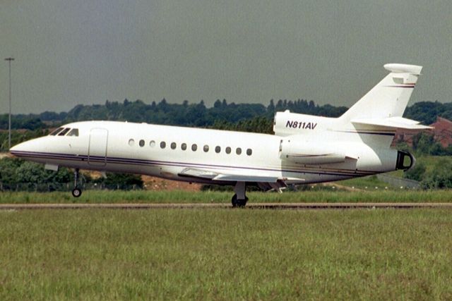 Dassault Falcon 900 (N811AV) - Touching down on rwy 26 on 8-Jun-04.  Reregistered N600LF, G-HNJC 5-Jan-07, transferred to Cayman Islands 14-Feb-07 where it became VP-CNZ then reregistered N740LM 26-Jul-08.