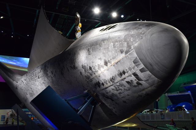 — — - Photo of underside Space Shuttle Atlantis OV-104 and her heat shield tiles after STS 135