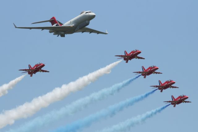 — — - Flypast of a Bombardier RAF Sentinel R1 and the RAF Red Arrows at RAF Waddington.