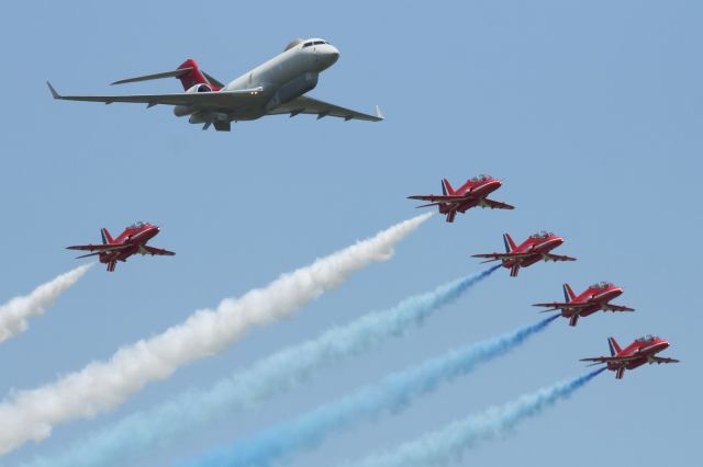 — — - Flypast of a Bombardier RAF Sentinel R1 and the RAF Red Arrows at RAF Waddington.