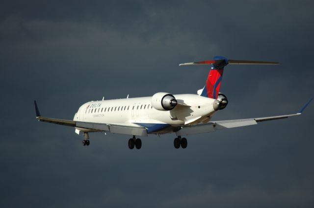 Canadair Regional Jet CRJ-700 (N15161) - on this day there was 27 to 38 kt winds coming from 255 degess so its 1 of the very few times they land on 27 during the day time hours of operation.