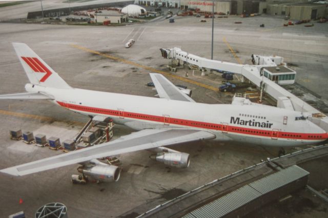 Boeing 747-200 (PH-MCE) - Looks like shes always had that dirty upper deck exit door!