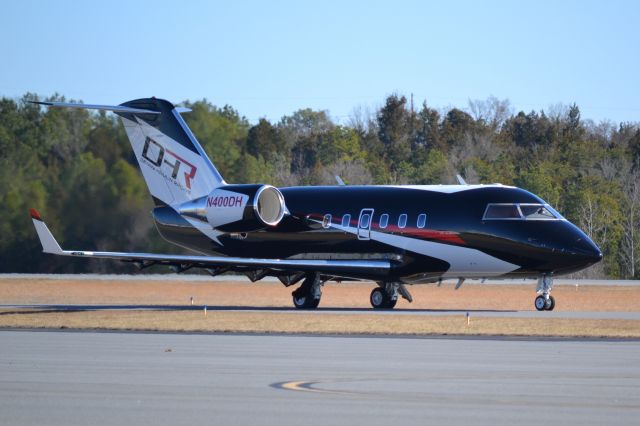 Canadair Challenger (N400DH) - JOE GIBBS RACING INC (NASCAR driver Denny Hamlin) at KJQF - 1/30/18