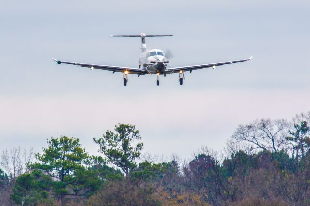 Pilatus PC-12 (N717NC) - This is a photo of N717NC a Pilatus PC-12 which is on final for Atlanta's PDK executive airport. I shot this with my Canon 800mm lens. The camera settings were 1/200 shutter, F13 ISO 160. I really appreciate POSITIVE VOTES & POSITIVE COMMENTS. Please check out my other aircraft photography. Questions about this photo can be sent to Info@FlewShots.com