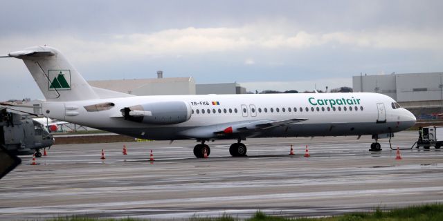 Fokker 100 (YR-FKB) - Arrived in TLS on a charter flight.