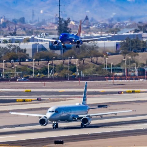 Airbus A321 — - An American Airlines A321 taking off from PHX on 2/24/23. Taken with a Canon R7 and Canon EF 100-400 ii lens.