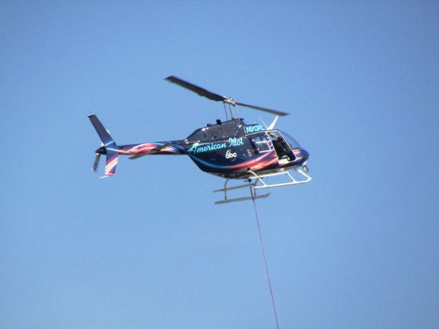 Bell JetRanger (N913RL) - Bell 206 JET Ranger in "American Idol" livery shooting an ad at Brackett Field