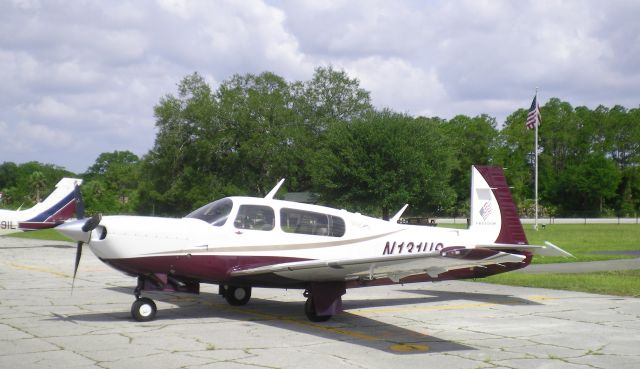 Mooney M-20 Turbo (N131US) - N131US is shown at Spruce Creek, Florida after a 2-day journey from Whitehorse, Canada (CXXY). The "Bravo" Mooney is equipped with a full Garmin glass suite, TKS ice protection and a Lycoming TSIO-540-AF1B.