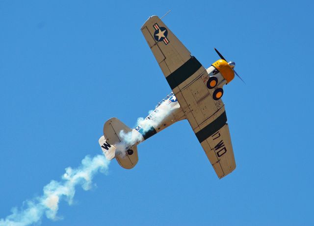 N1038A — - John Collver rolling his SNJ-5 at the 2014 Hollister Airshow.