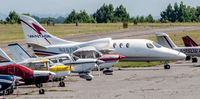 VISIONAIRE Vantage (N247VA) - She sits quickly way down on the ramp at Hickory Regional Airport..