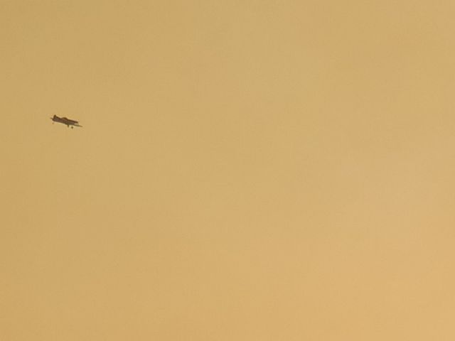 — — - Watching fire bombers (modified cropdusters) hit the Black Range fire Stawell, Vic.