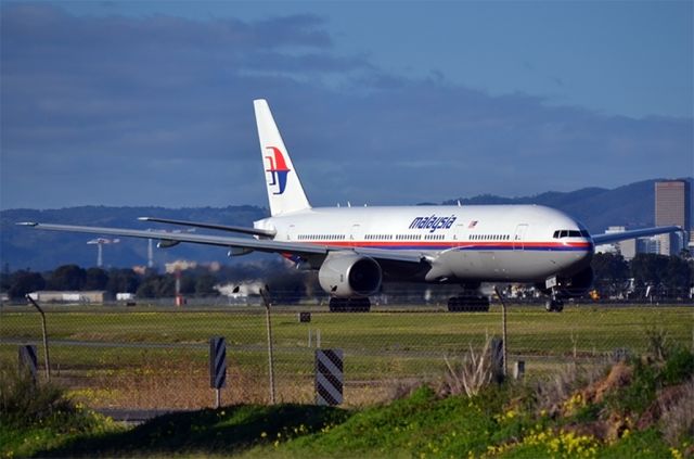 Boeing 777-200 (9M-MRL) - On taxi-way, heading for take-off on runway 05, for return flight to Kuala Lumpur.