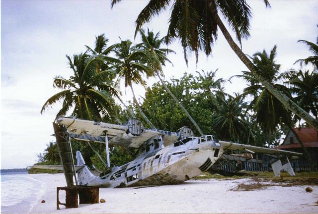 VOZ17 — - "Katie" RAF Squadron 240 PBY Catalina, Diego Garcia back in the 80's - https://www.squadronposters.com/71670-2/