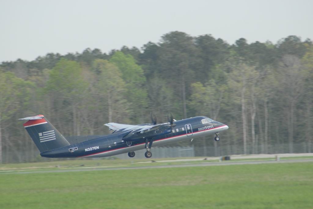 N327EN — - Dash 8 300 Series a/c takingoff towards CLT.