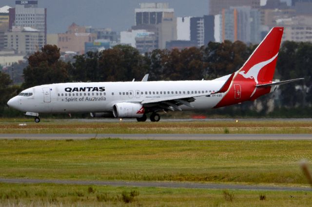 Boeing 737-800 (VH-VXS) - On taxi-way heading for Terminal 1 after landing on runway 23. Friday 5th October 2012.