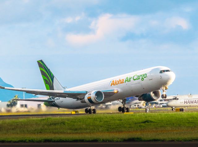 BOEING 767-300 (N399CM) - Departing 26R for LAX. View from Aloha Cargo ramp.