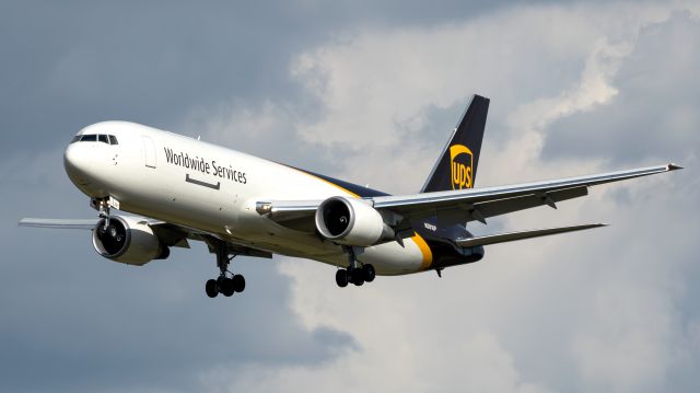 BOEING 767-300 (N381UP) - The usual "Sunday Suspect" arriving from SDF. This time in the form of this fresh 7-month old 763F! Also appears to be the sister ship to another 767 I've captured previously. I love those clouds!