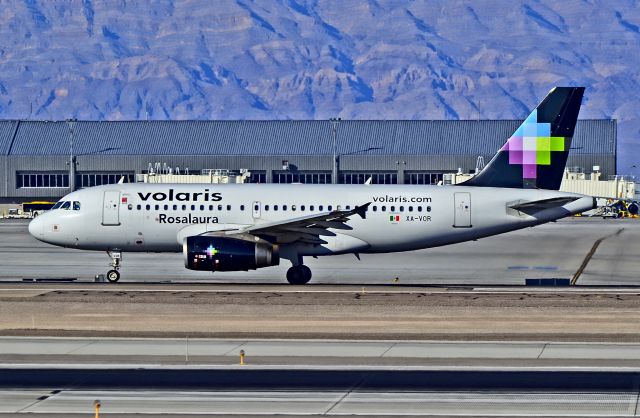 Airbus A319 (XA-VOR) - XA-VOR Volaris Airlines 2004 Airbus A319-132 (cn 2296) "Rosalaura" - Las Vegas - McCarran International (LAS / KLAS)br /USA - Nevada, November 3 , 2013br /Photo: Tomás Del Coro