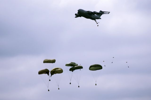 — — - C-17 Cargo drop at McChord Air Force Base