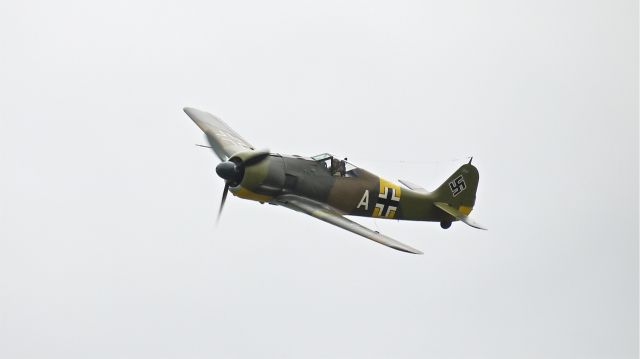 FOUR WINDS 192 (N19027) - Flying Heritage Collections Focke Wulf FW 190-A5 (Ser#0151227) makes a fast pass during Fly Day 6/16/12.