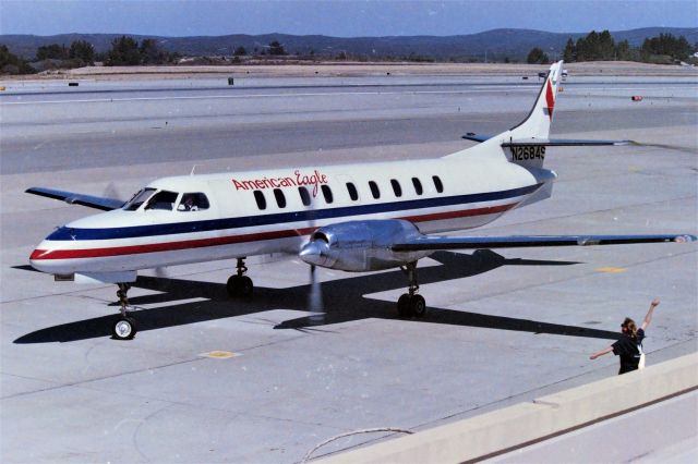 Fairchild Dornier SA-227DC Metro (N2684S) - KMRY - June 1988 shows an LA Bound Metro Eagle turning right out of the gate for Runway 28 departure - photo before the glass wall was was built ruining another great Obs deck.