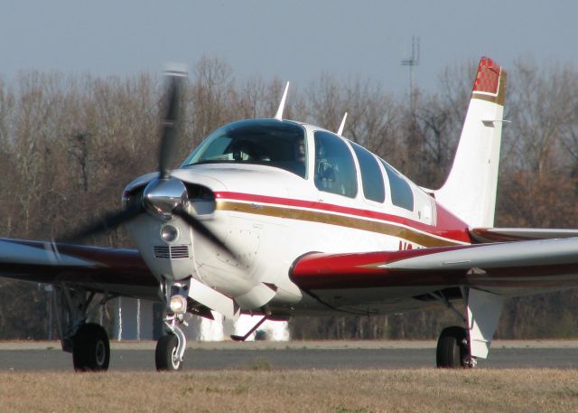 Beechcraft Bonanza (36) (N249WL) - On taxiway Foxtrot heading to runway 14 at the Downtown Shreveport airport.