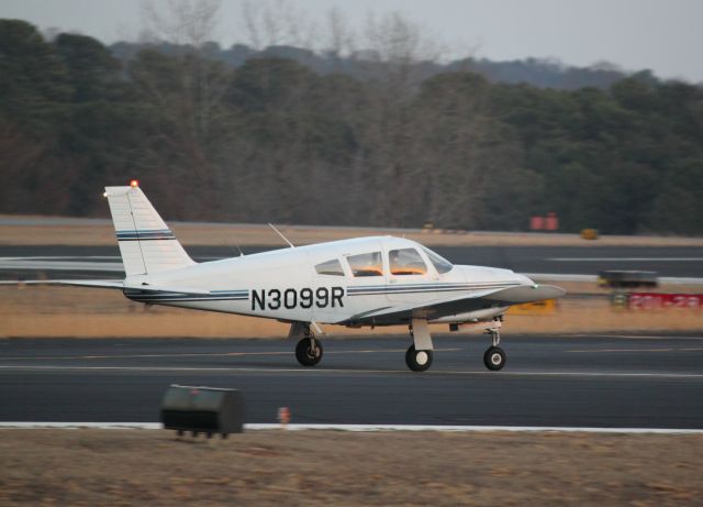 Piper Cherokee Arrow (N3099R) - Taxiing on to 20R at PDK on 02/16/2011