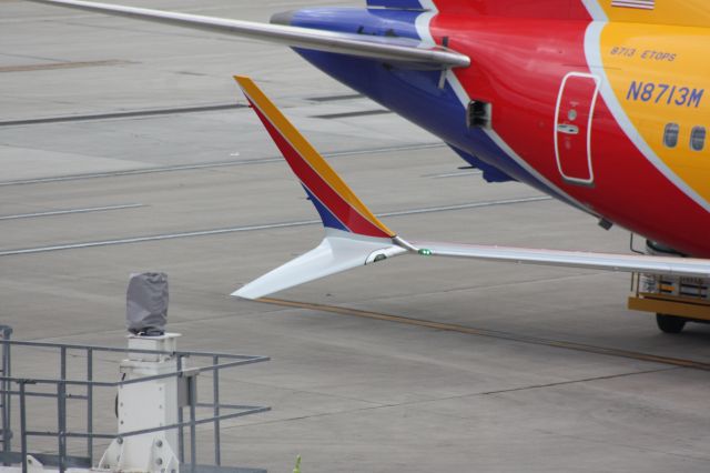 Boeing 737 MAX 8 (N8713M) - Here is a closer look at N8713Ms advanced technology winglets. The view is from the airport level 5 in the garage. 