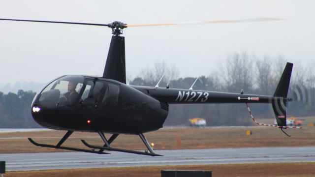 Robinson R-44 (N1273) - Performing one of many flybys during basic helicopter maneuver traning.