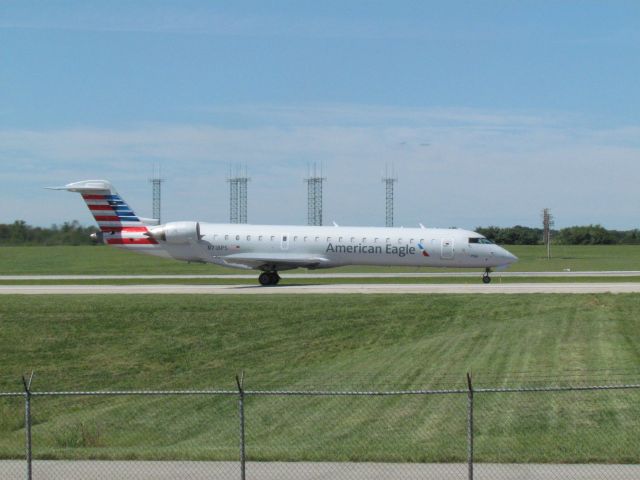 Canadair Regional Jet CRJ-700 (N718PS) - American Airlines CRJ-700 taxing parallel to runway 18/36C at CVG