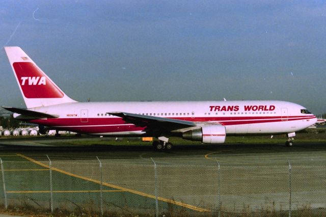 BOEING 767-200 (N606TW) - KSFO - late 1988-89 JFK bound 767-2 on hold Runway 1R at San Francisco. Photo from the Millbrae Avenue Airpark.