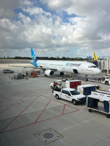 C-GEZD — - Air Transat arrival from Canada getting ready to go back to TS/TSC 617 to Quebec City, with a Spirit Airbus poking its tail in the background. 