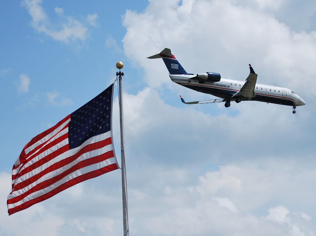 Canadair Regional Jet CRJ-200 (N446AW) - Final for runway 23 - 6/25/13