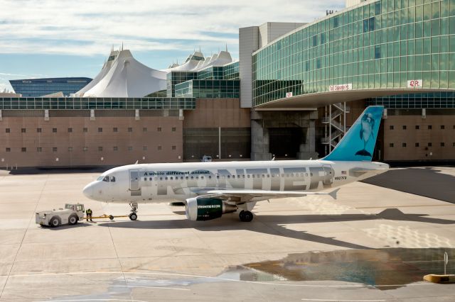 Airbus A319 (N927FR) - Frontier A319 pushing back from gate A40 at KDEN