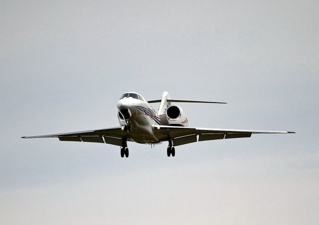 — — - An afternoon landing by a Citation X. Sorry, couldnt get the tail number.