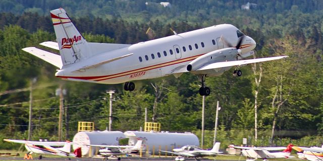 Saab 340 (N365PX) - PenAirs Saab 340B serving the twice/thrice-daily service to Boston-Logan from Bar Harbor Airport near Acadia National Park, Maine. Taken from the balcony at Acadia Sunrise Motel.