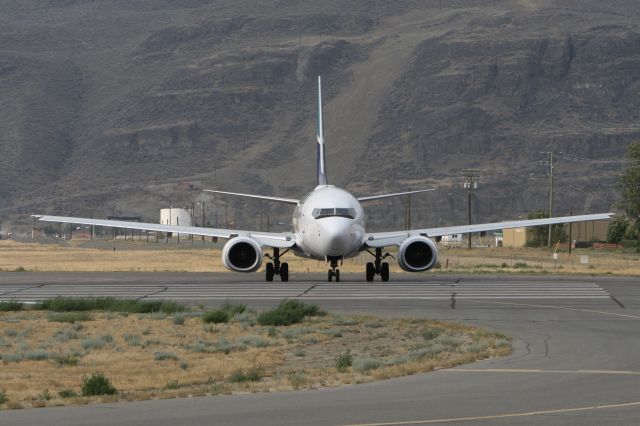 BOEING 737-600 (C-GWSN) - August 1, 2009 - coming toward runway threshold for take off from Kamloops, BC