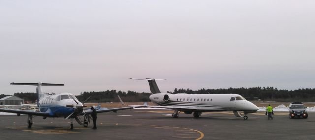 Embraer ERJ-135 (N910FL) - 1/22/16 Embraer Legacy and PC12 at Orange.