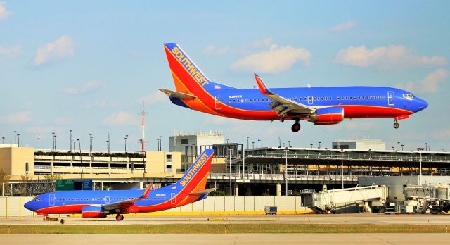 — — - Southwest 737 landing on 22L Chicago Midway, June 2014.